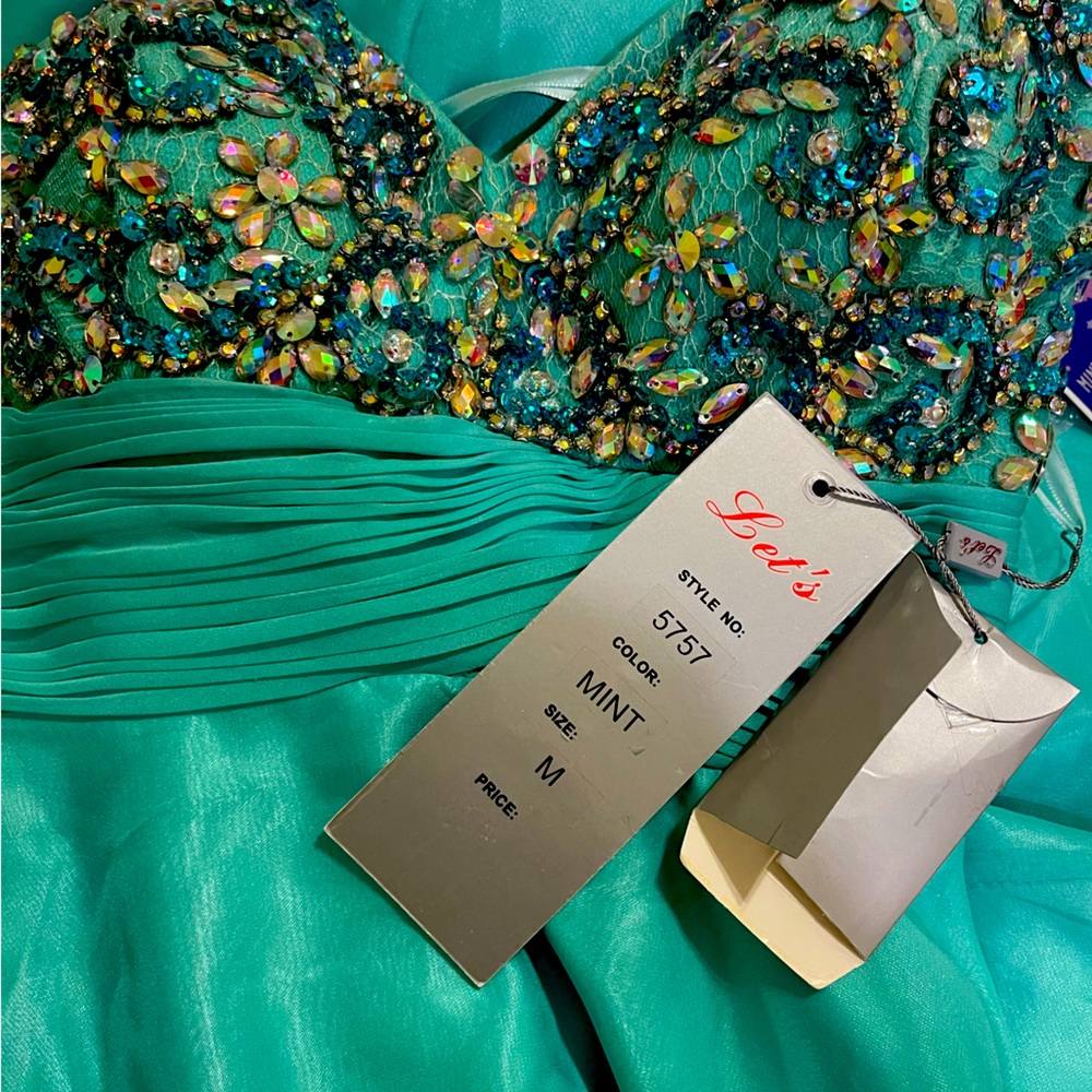 long mint green dress, new embroidery with tags perfect for prom or dance night